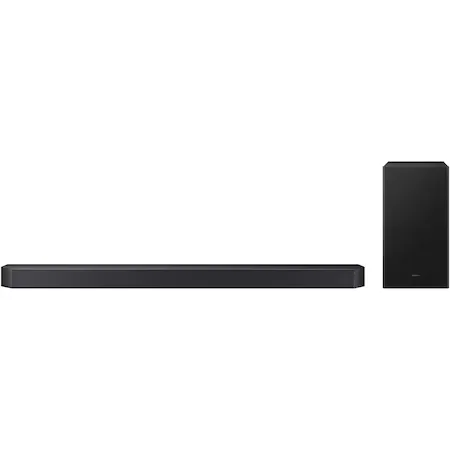 Soundbar sub un televizor pe un living modern